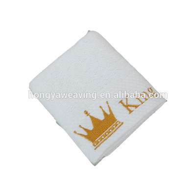 Customized logo 100%cotton dobby board luxury hotel bath towel